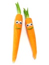 Fresh carrots with happy faces