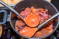 Fresh carrots and onions frying in pan casserole Royalty Free Stock Photo