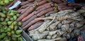 Fresh carrots and parsnips at a farmers market