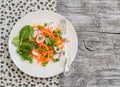 Fresh carrots, radishes, spinach and green peas salad. Healthy food.