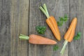 Fresh carrots and sliced on wooden table rustic Royalty Free Stock Photo