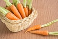 Fresh carrots on wooden background Royalty Free Stock Photo