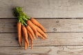 Fresh carrots  on the wooden background Royalty Free Stock Photo