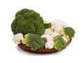 Fresh cauliflower and broccoli in a wooden basket isolated on a white background. The concept of proper nutrition Royalty Free Stock Photo