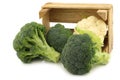 Fresh cauliflower and broccoli in a wooden crate Royalty Free Stock Photo