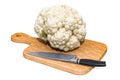 Fresh cauliflower lies on a wooden board next to a knife, 3D rendering Royalty Free Stock Photo