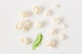 Fresh cauliflower.white background.food backdrop.top view