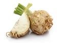 Fresh celeriac and slice on white background Royalty Free Stock Photo