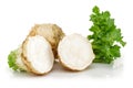 Fresh celeriac with slices isolated on white