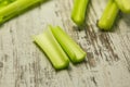 Fresh celery sticks on a wooden background. Royalty Free Stock Photo