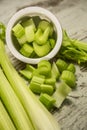 Fresh celery sticks on a wooden background. Royalty Free Stock Photo