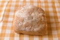 Fresh chabata bread on a yellow towel on a white background Royalty Free Stock Photo