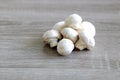 Fresh champignons on a wooden board