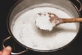 Fresh cheese making process, clotted cheese in a saucepan