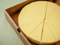 Fresh cheesecake in opened paper box, close up. Royalty Free Stock Photo