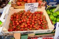 Fresh cherrie vine in boxes selling at Portobello Market in Portobello Road, Notting Hill, UK