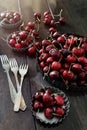 Fresh cherries in aluminum plates Royalty Free Stock Photo