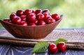 Fresh cherries in bowl on table Royalty Free Stock Photo