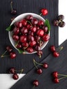 Fresh cherries in bowl on table Royalty Free Stock Photo