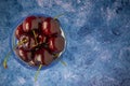 Fresh cherries in a glass of water Royalty Free Stock Photo