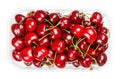 Fresh cherries in a plastic container, fruits of Prunus avium Royalty Free Stock Photo