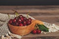 Fresh cherries in wooden bowl Royalty Free Stock Photo