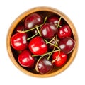 Fresh cherries, in a wooden bowl, red and ripe fruits, ready to eat Royalty Free Stock Photo