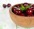 Fresh cherries in a wooden bowl Royalty Free Stock Photo