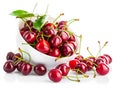 Fresh cherry berries with green leaf Royalty Free Stock Photo