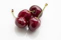 Fresh cherry berries on a white background close-up