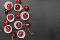 Fresh Cherry Fruit Health Vitamine in Cooking Bakery Cupcake Paper. Black Background Copy Space. Royalty Free Stock Photo