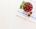 Fresh cherry on plate on wooden white background. fresh ripe cherries. sweet cherries Royalty Free Stock Photo