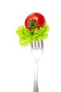 Fresh cherry tomato on fork isolated at white Royalty Free Stock Photo