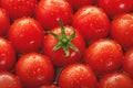 Fresh cherry tomatoes Close up with dewdrops, background texture, red hearts