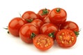 Fresh cherry tomatoes and a cut one Royalty Free Stock Photo