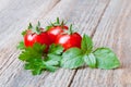 Fresh cherry tomatoes on old wooden table