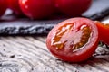 Fresh cherry tomatoes. Ripe tomatoes on oak wooden background