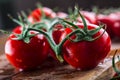 Fresh cherry tomatoes washed clean water. Cut fresh tomatoes Royalty Free Stock Photo