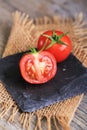 fresh cherry tomatoes on wooden background