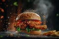 fresh chicken burger sandwich with flying ingredients and spices, Macro Royalty Free Stock Photo