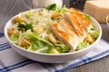 Fresh Chicken Caesar Salad on a Wooden Table Royalty Free Stock Photo