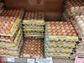 Fresh chicken eggs in a pallet container, for sale in a supermarket. Sort by grade and size.