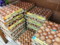 Fresh chicken eggs in a pallet container, for sale in a supermarket. Sort by grade and size.