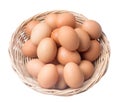 Fresh chicken eggs in woven bamboo basket isolated on white background with clipping path, Top view photo Royalty Free Stock Photo