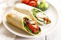 Fresh chicken fajita wrap sandwiches on white plate Royalty Free Stock Photo