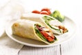 Fresh chicken fajita wrap sandwiches on white plate Royalty Free Stock Photo