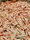 Fresh chicken feet in supermarket for sale,Pile up on ice color pink