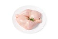 Fresh chicken legs.Top view Two raw whole chicken legs on a white plate on a white isolated background Royalty Free Stock Photo