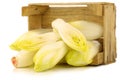 Fresh chicory in a wooden crate Royalty Free Stock Photo