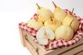 Fresh chinese pears on wooden crate